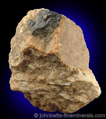 Partial Columbite Crystal in Albite