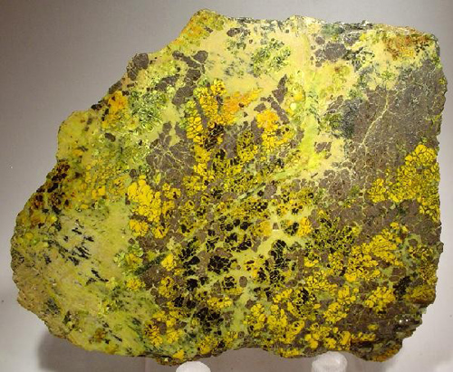 Gummite Slab with Uraninite and Zircon