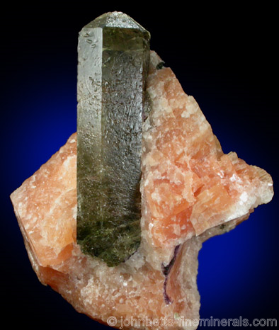 Elongated Apatite in Orange Calcite from Yates Mine, Huddersfield Township, Otter Lake, Pontiac County, Quebec, Canada.