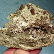 Brookite on Albite