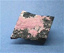 Pink Bustamite with Franklinite from Franklin, Sussex Co., New Jersey