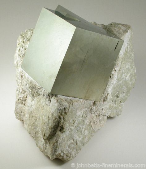 Intergrown Pyrite Cube in Matrix from Victoria Mine, Navajún, La Rioja, Spain.