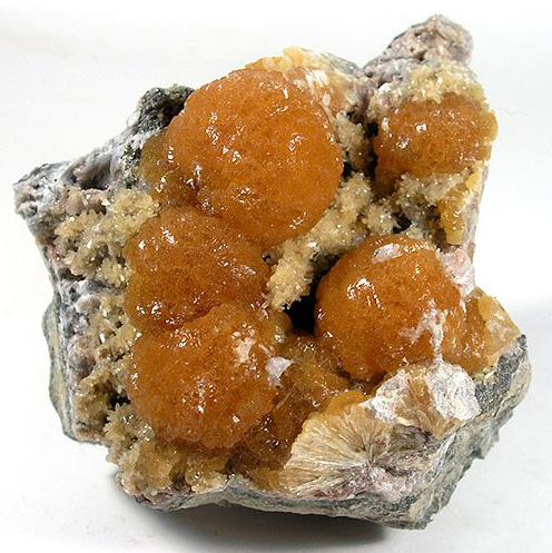 Orange Stellerite Clusters from Saranovskiy Mine, near Rudniy, Kazakhstan